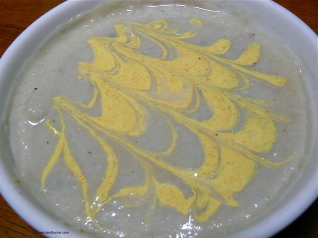 Cauliflower cashew soup with curry yogurt sauce mixed