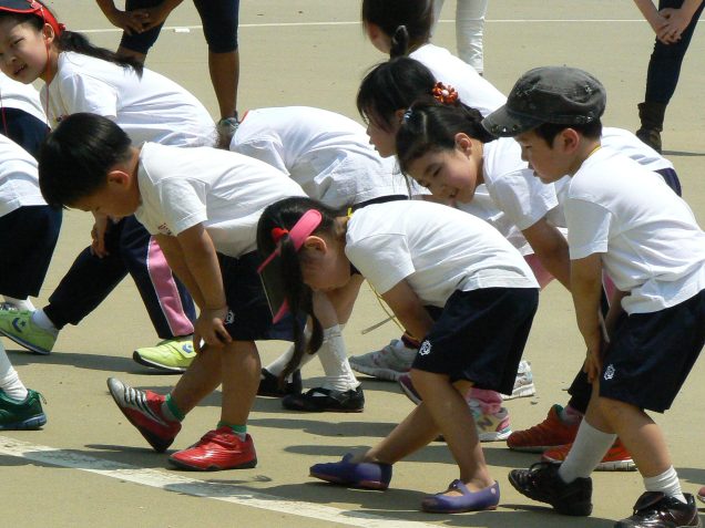 Korean children doing stretches