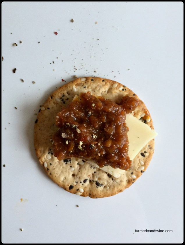 slow cooker tomato sauce on cracker